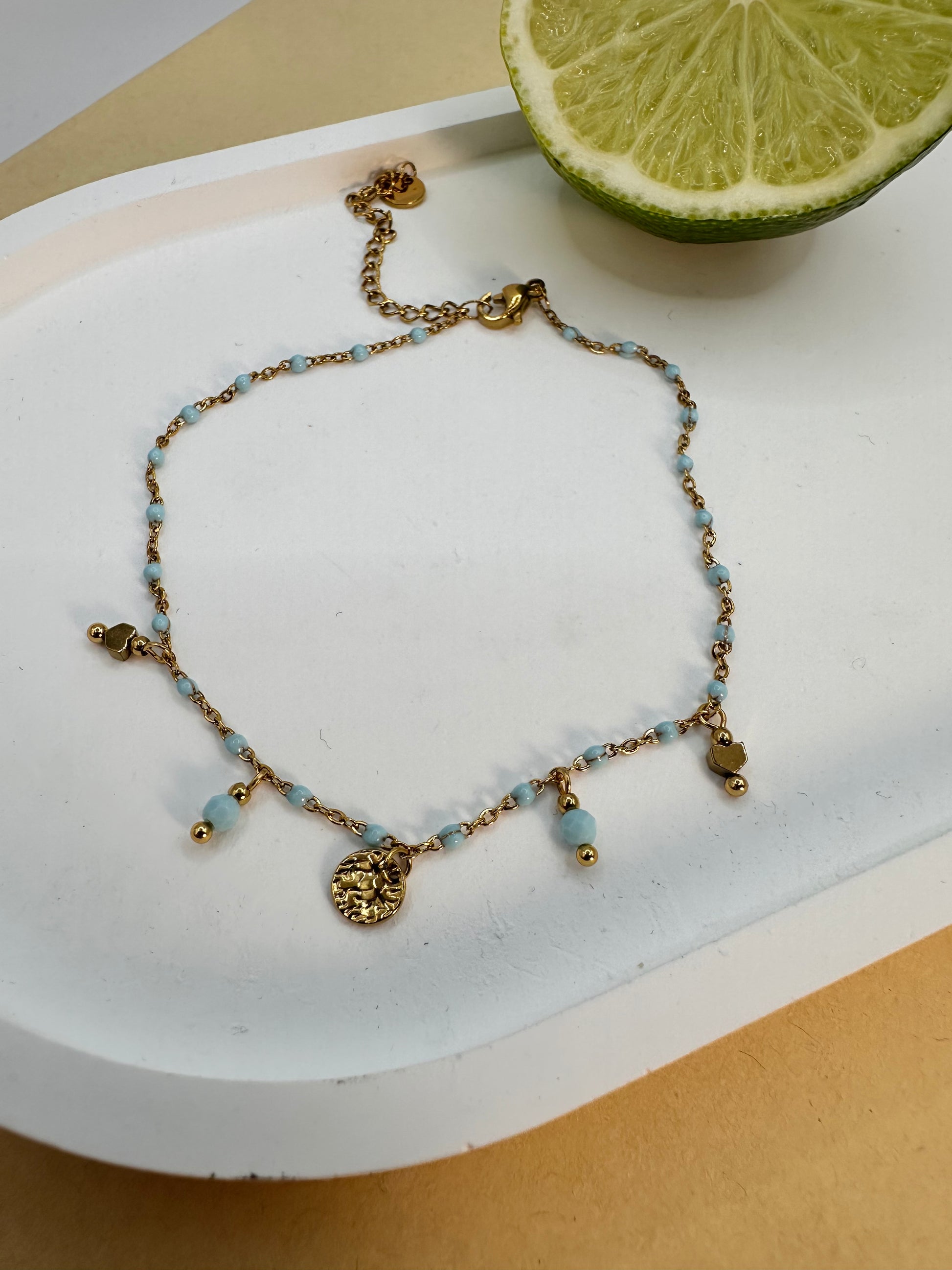 bracelet bleu breloque 